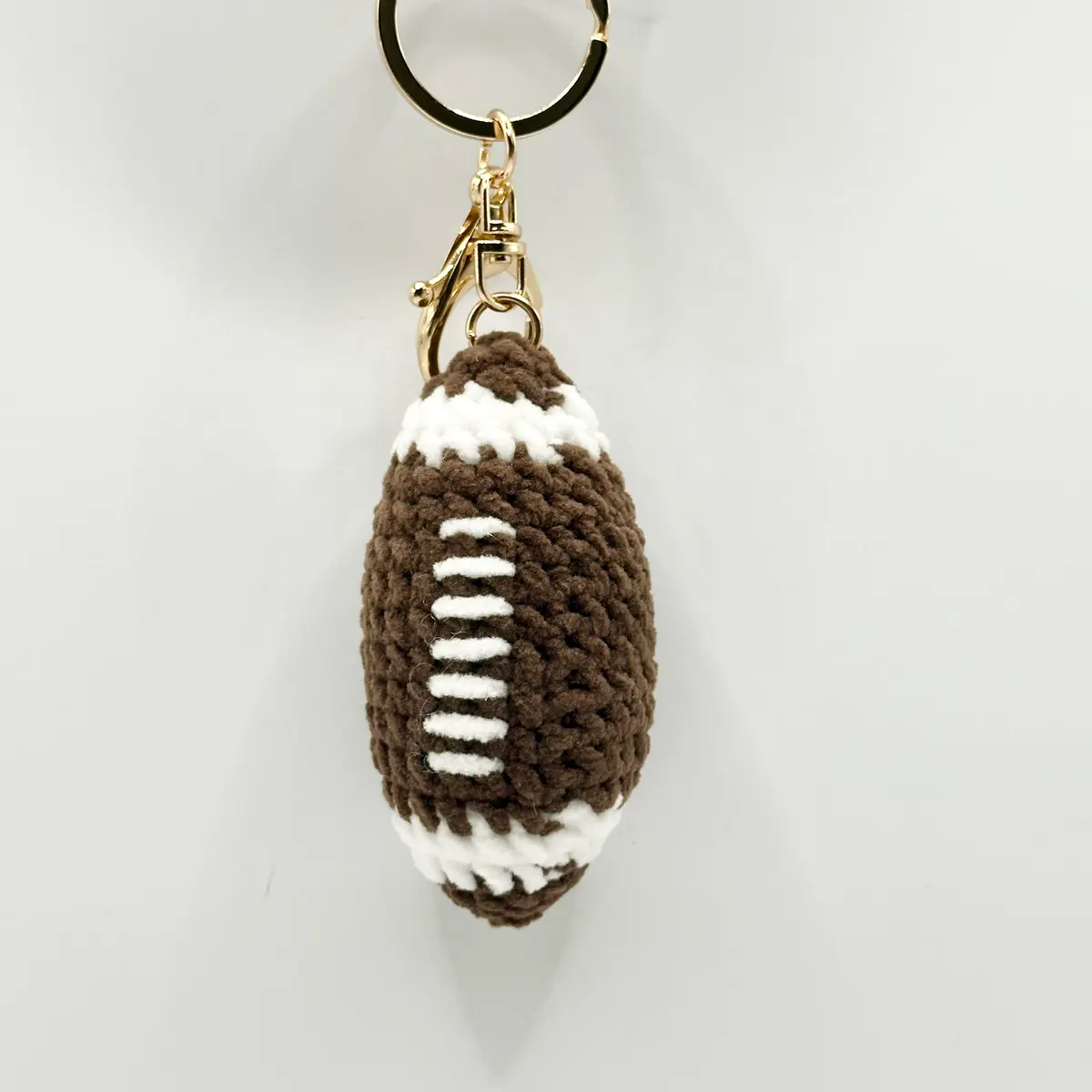 Football charm in Brown